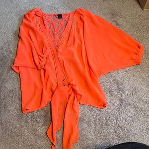 BKE coral button up blouse with lace detail and front tie